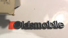 555744 Gm Nos Oldsmobile Header Panel Emblem Script Cutlass Various Others