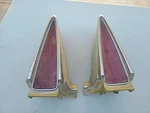 70 Cadillac Deville Pair Tail Light Lens Bezel Trim Quarter Panel Extension. Fixed Price $250.00.