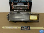 Oem 76 Cadillac Eldorado Left Front Fender Cornering Turn Signal Park Light Lens. Fixed Price $129.99.