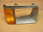 Vintage 1981 1983 1984 Ford Escort Rh Headlight Bezel W/ Corner Turn Signal Lens. Fixed Price $35.00.