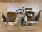 Pair Of 53 Cadillac Radiator Extension Moldings Fog Lamp Housings And Bezel. Fixed Price $379.50.