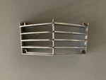 1964 Cadillac Park Light Grill (nos). Fixed Price $100.00.
