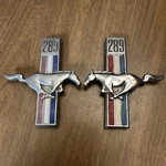 Preowned 68 Mustang 289 Fender Emblems C8ZZ-16228-A Pair #2. Fixed Price $50.00.
