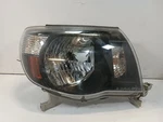 Passenger Right Headlight From 2009 Toyota Tacoma 12237388. Fixed Price $84.94.
