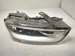 2015 Audi Q3 Passenger Side Headlight Lamp Xenon Self Adjusting Oem 8U0941043F. Fixed Price $1000.00.