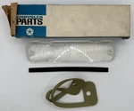 New Old Stock Right Back Up Lens For 1963-64 Models Mopar #2299336. Fixed Price $140.00.