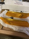 New Porsche 987.631.033.01 And 987.631.034.01 Side Markers. Fixed Price $32.00.