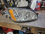 P54-6162-100R T660 Kenworth Rh Headlight Assembly. Fixed Price $175.00.