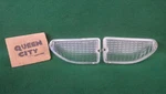 Pair 1970 Mustang Original Parking Light Lenses Clear SAE-PI-70-MG. Fixed Price $30.00.