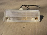 1974-77 Pontaic Firebird Rear Bumper License Plate Light Lens HOUSING--5946660. Fixed Price $34.95.