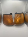 Set 1985-90 Ford Escort Left & Right Parking Lamp Light E6EB-13215/13216-AD Pair. Fixed Price $29.99.
