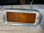 Ford SAE-PI-65 Tk Left Park Light Used 1965-1966 F100 With Bezel. Fixed Price $79.00.