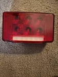 Weldon Rear Combination Lamp W/ License Plate 2351-0100-00. Fixed Price $43.00.