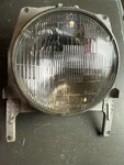 Vintage Bosch Headlight Assembly LE1657AF Germany General Electric 2D1 7" Oem. Fixed Price $31.49.