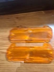 #5956671 & #5956672 Turn Signal Lens (amber). Fixed Price $50.00.